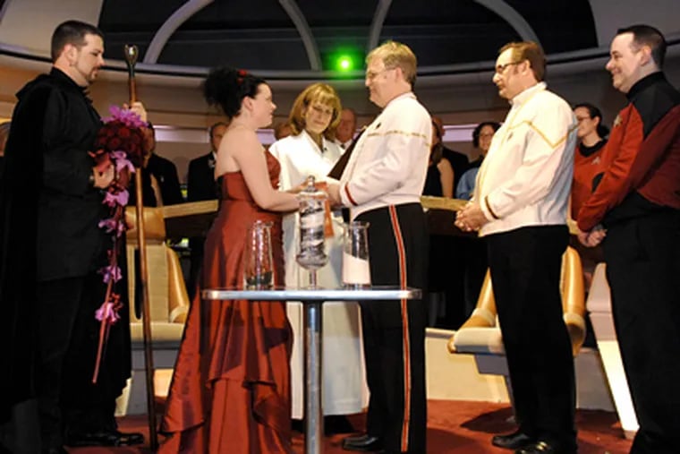 The happy Class M planet couple, Kate Erwin and Brad Siegel, who met at a Trekkie convention, were joined in holy and Federation-approved matrimony last night as winners of the Franklin Institute's Star Trek Exhibition Wedding Competition. (Alyssa Cwanger / Staff)