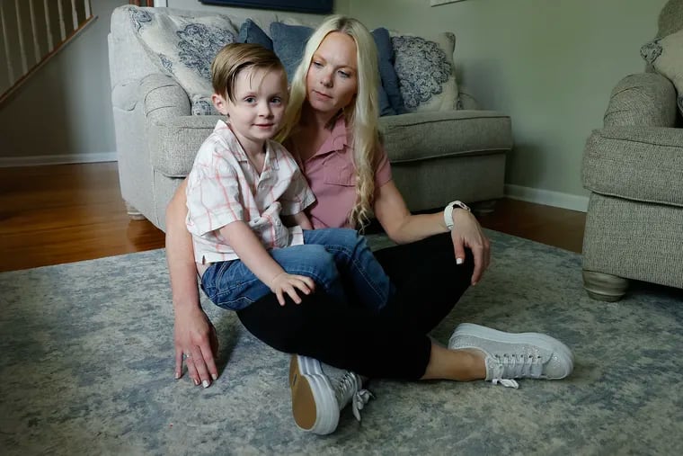 Allison Welsh with her 6-year-old son, Levi, in their home in Washington Township. Welsh was horrified when she saw a video of her son crying in his Wedgwood Elementary School kindergarten classroom that was posted online by his special education teacher.
