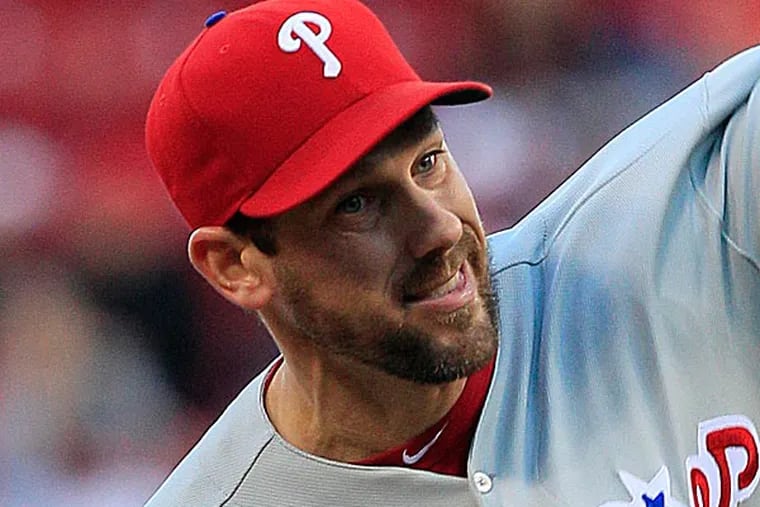 Cliff Lee's walk streak ended and soon after, his string of shutout innings would, the Reds capitalized in a 4-2 win over the Phillies. (Al Behrman/AP)