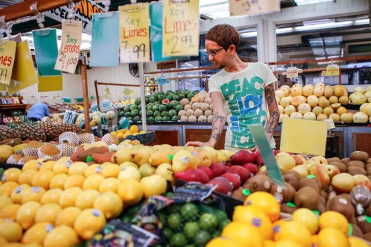 Johnny Righini shops for produce at Sigona's Farmers Market in Redwood City, Calif., on August 21, 2014. Righini is in recovery for what eating disorder experts call orthorexia, an obsession with healthy eating that can be physically and mentaly debilitating. (John Green/Bay Area News Group/MCT)