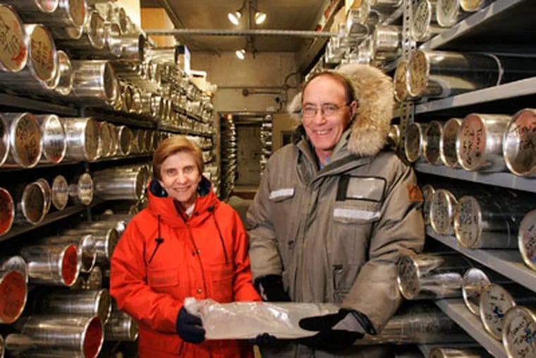 Lonnie Thompson, right and his wife and research partner Ellen Mosley-Thompson stand in the "cold room," where ice cores are stored in the minus-30-degree freezer at Byrd Polar Research Center at Ohio State University Friday, Dec. 21, 2007 in Columbus, Ohio. (AP Photo/Kiichiro Sato)
