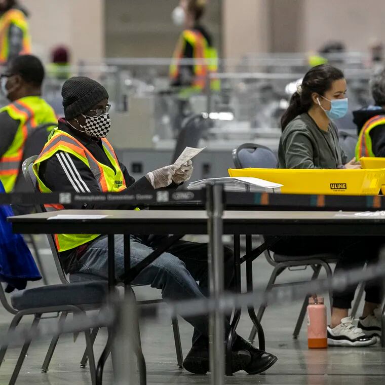 Ballots being unfolded at the Pennsylvania Convention Center in Philadelphia on Nov. 4, 2020.