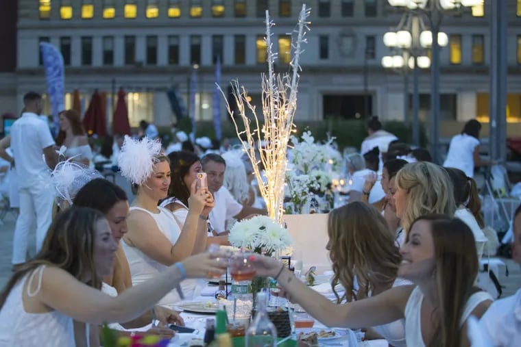 The 7th annual Diner en Blanc at Dilworth Plaza and outside the Municipal Services Building on August 16, 2018.