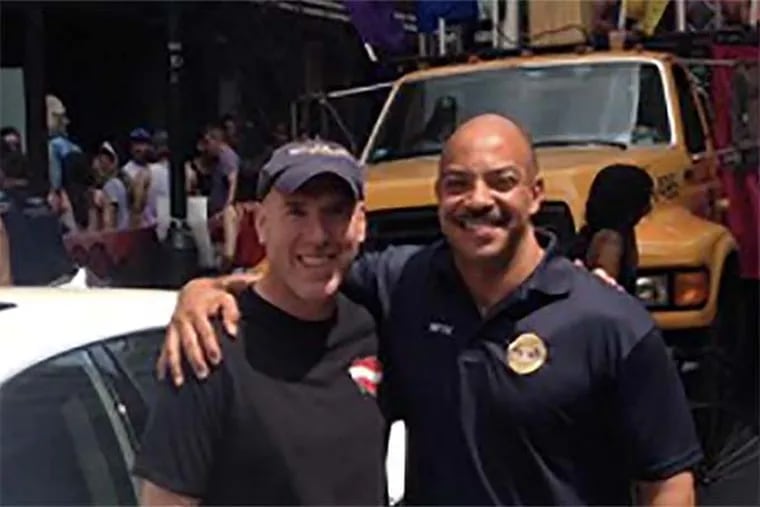 Michael Weiss (left) and Philadelphia District Attorney Seth Williams, outside the Gayborhood landmark Weiss  owns, Woody&#039;s Bar, at the start of the city&#039;s 2015 Gay Pride day.