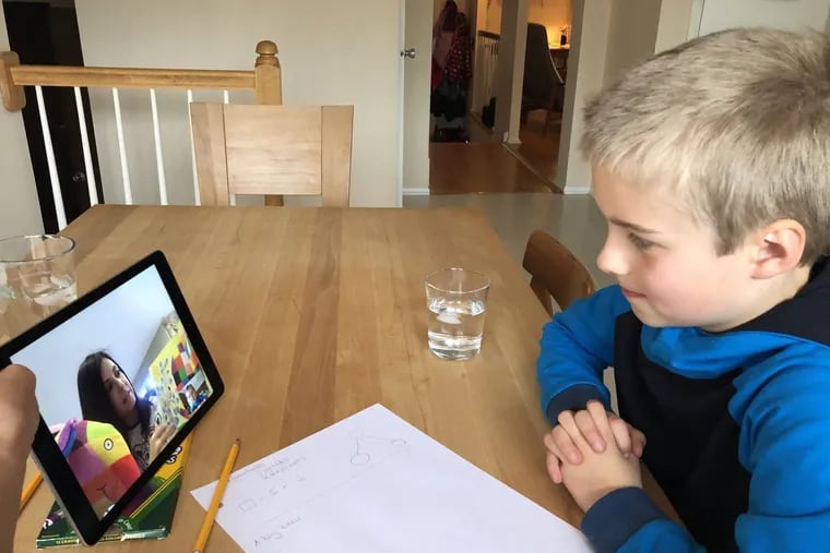 Piet Queisser, a kindergartner at Cooper Elementary in Cherry Hill, talks with teacher Jill Hammel via FaceTime. Hammel uses technology to keep up with her students while school is closed due to the coronavirus pandemic.