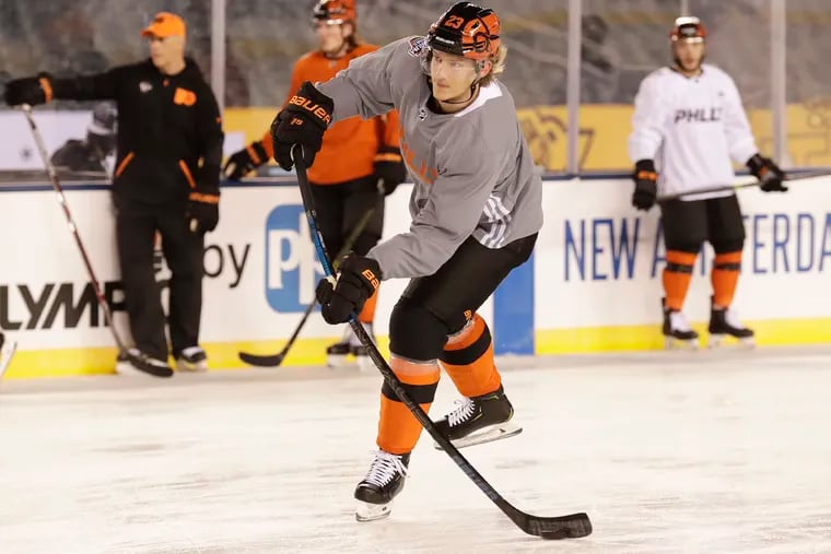 Flyers left wing Oskar Lindblom shoots the puck during practice at Lincoln Financial Field on Friday. Weather conditions could make things quite interesting for sports bettors.