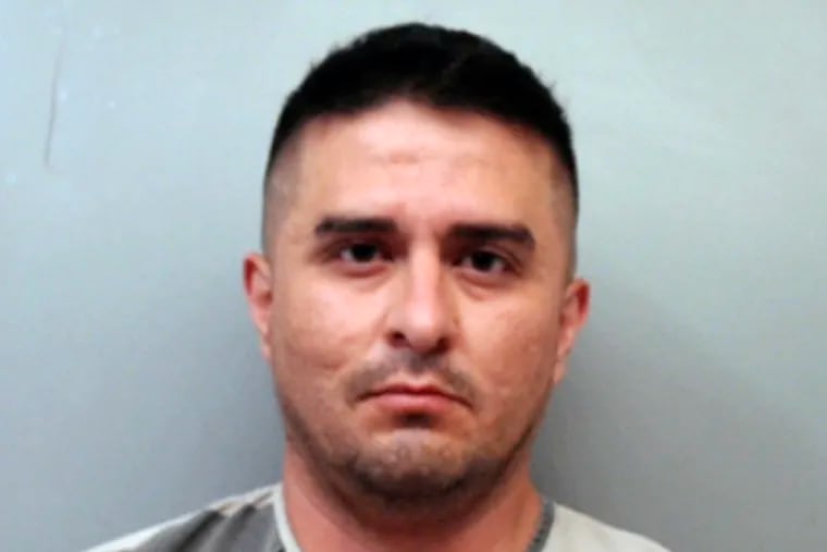 FILE - This file photo provided by the Webb County Sheriff's Office shows U.S. Border Patrol agent Juan David Ortiz. Ortiz, who confessed to shooting four women in the head and leaving their bodies on rural Texas roadsides, was indicted Wednesday, Dec. 5, 2018, on a capital murder charge.  (Webb County Sheriff's Office via AP, File)