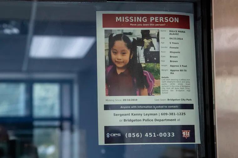 A missing poster of 5-year old Dulce Maria Alavez is shown posted on the window of the Bridgeton Police department in Bridgeton, N.J. Wednesday, September 18, 2019.