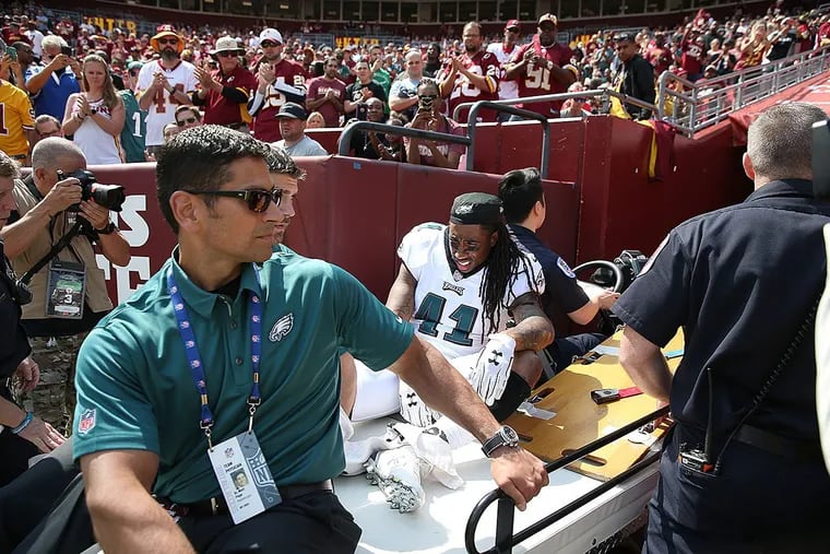 Ronald Darby is carted off the field in the 2nd quarter of the Eagles’ game against the Redskins.