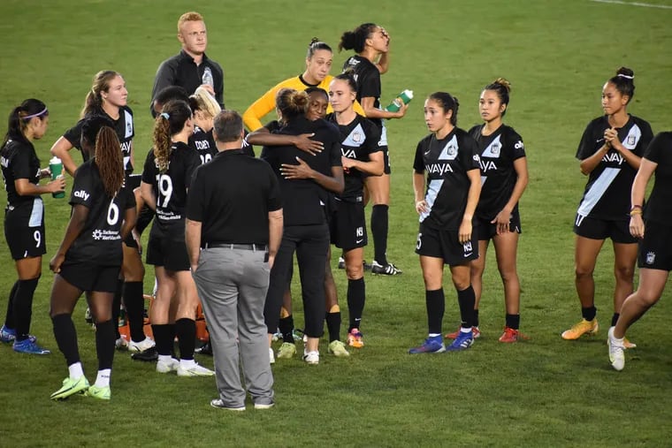 Departing Gotham FC manager Freya Coombe, center, got a postgame hug from Ifeoma Onumonu after Sunday's 1-0 loss to the Orlando Pride at Red Bull Arena.