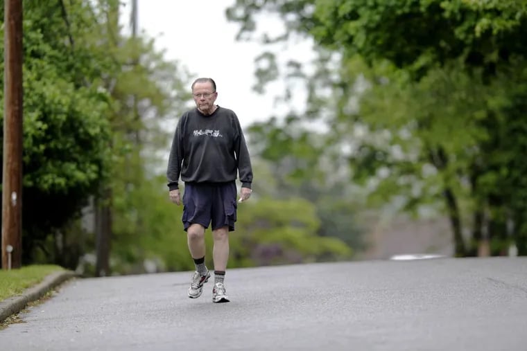 Bill Lyon takes his daily walk around his Broomall neighborhood.