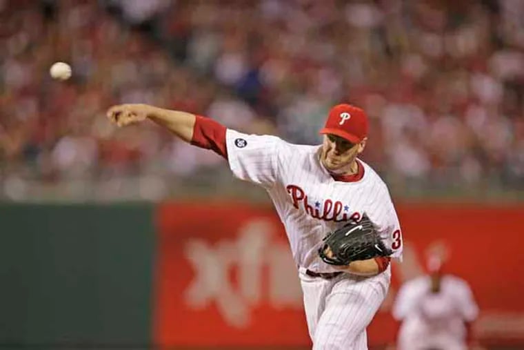 Roy Halladay pitches in the first inning of Game 1 of the 2010 NLCS.