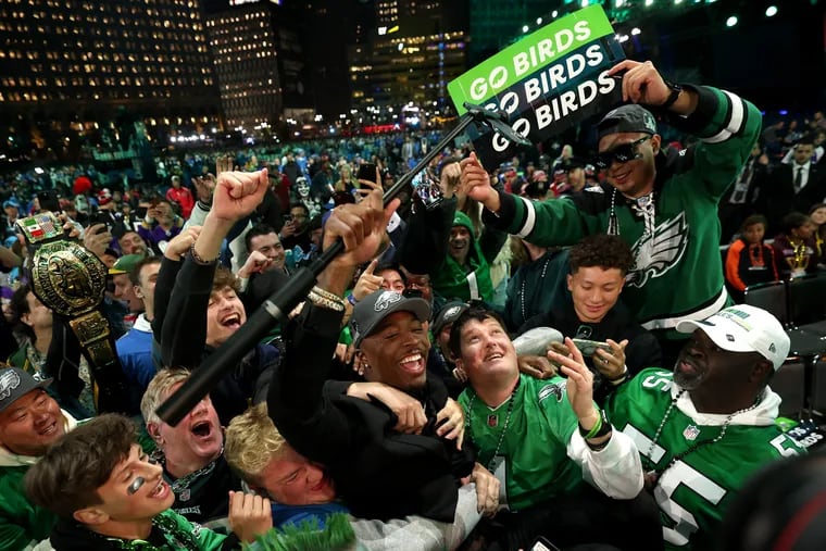Quinyon Mitchell celebrates with fans after being selected 22nd overall by the Philadelphia Eagles during the first round of the 2024 NFL Draft at Campus Martius Park and Hart Plaza on April 25, 2024 in Detroit, Michigan. (Photo by Gregory Shamus/Getty Images)