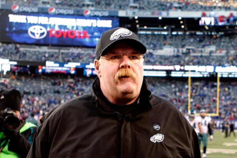 Eagles Andy Reid walks off the field at the end of the game. Philadelphia Eagles vs New York Giants on Sunday, December 30, 2012 at MetLife Stadium. ( Ron Cortes / Staff Photographer )