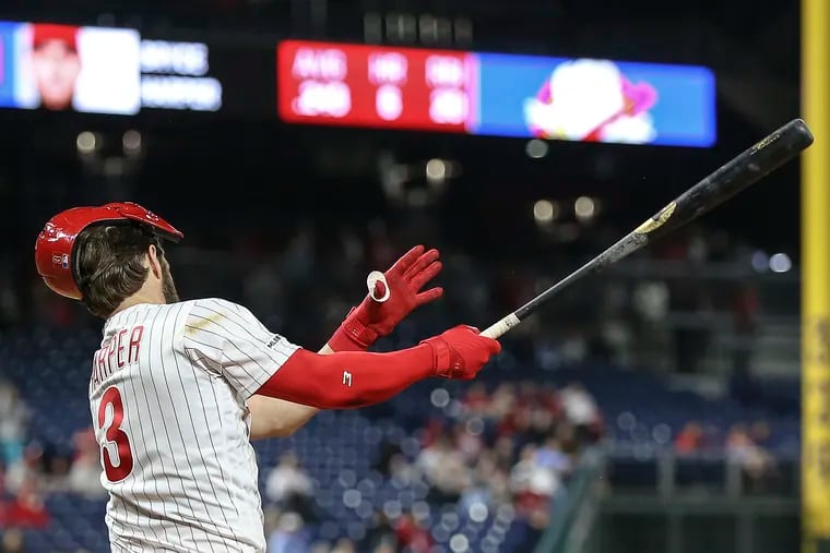 Phillies' Bryce Harper looses his helmet on the first swing against the Tigers during the 8th inning at Citizens Bank Park in Philadelphia, Tuesday, April 30, 2019   Tigers beat the Phillies 3-1.