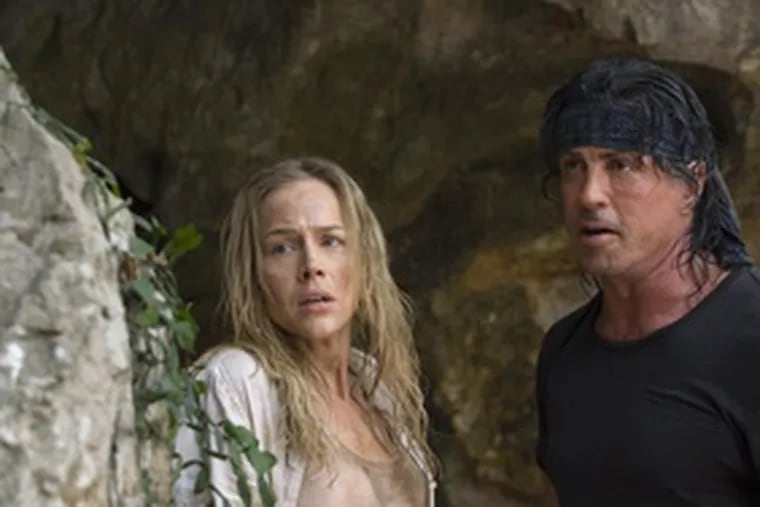 Julie Benz plays a pretty missionary begging Rambo (Sylvester Stallone) to assist the faithful against the demonic Myanmar military.