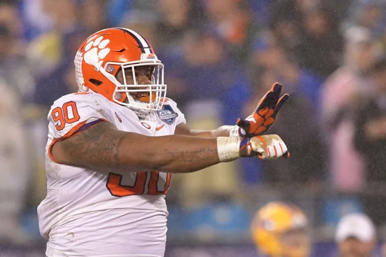 Dexter Lawrence #90 of the Clemson Tigers reacts against the Pittsburgh Panthers in the first quarter during their game at Bank of America Stadium on December 1, 2018 in Charlotte, North Carolina.