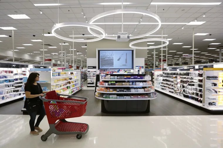 A shopper walks through the updated cosmetic department at a Target store in San Antonio.