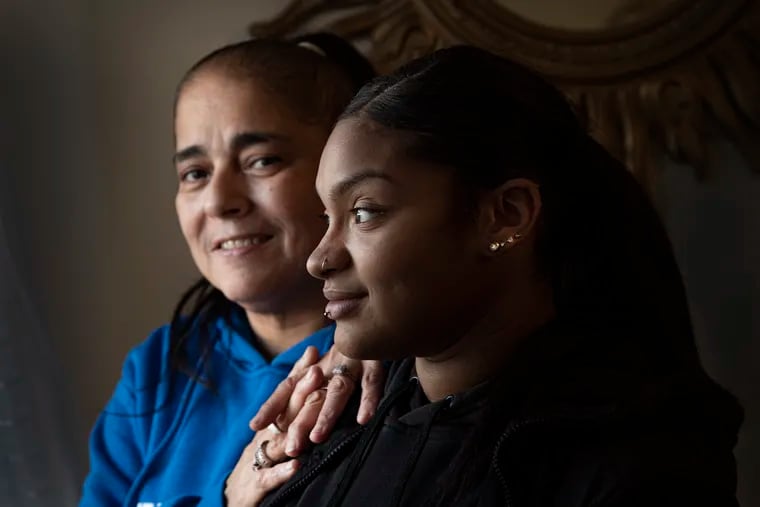 Daisy Matos pose for a photo with her daughter  Jada Pacheco at their home in Philadelphia, Pa. Friday, January 14, 2022.