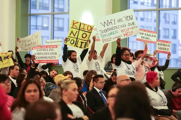 Students protest ahead of the Philadelphia school board's vote Thursday to non-renew Stetson and Olney charter schools.
