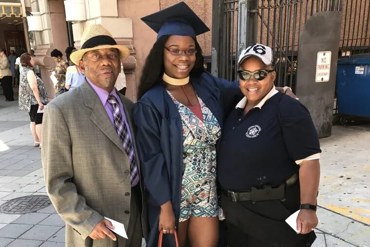 Just-retired Philadelphia police officer Darlene Chapman (right) has moved in with her elderly father, Douglas Dervin. Also pictured, her grandchild Shatiyah Harley.