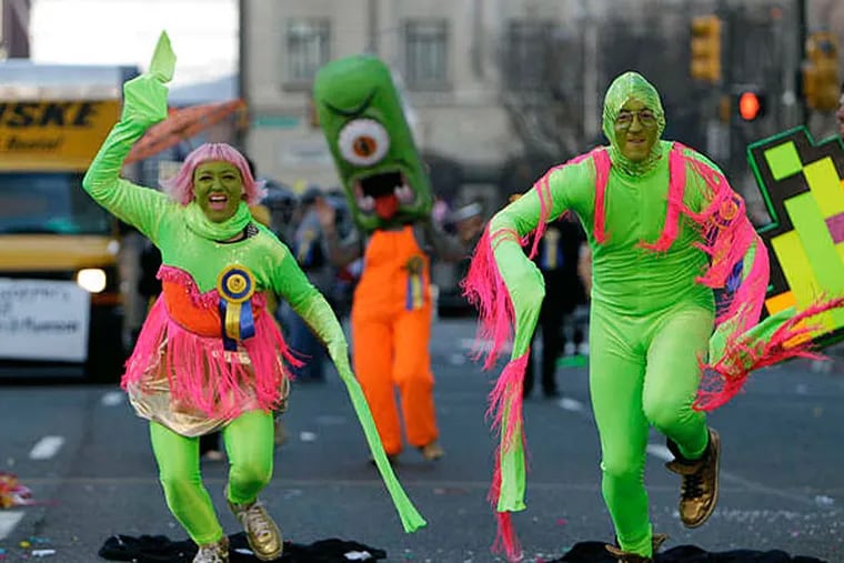 The Vaudevillains New Years Brigade performs in front of the judge's stand at the Mummers Parade in 2012. (DAVID MAIALETTI / File Photograph)