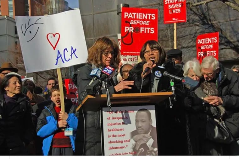 Jacqueline Silver (right) speaks at a PASNAP rally.