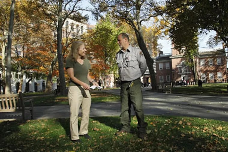Susan Edens, cultural landscape architect for Independence National Historic Park, and Ray Corrato, a park gardener, stand at Independence Square where an American and Chinese hybrid chestnut tree will be planted. The Chinese part of the hybrid provides resistance to the blight that wiped out the American chestnut. (Michael S. Wirtz / Staff Photographer)