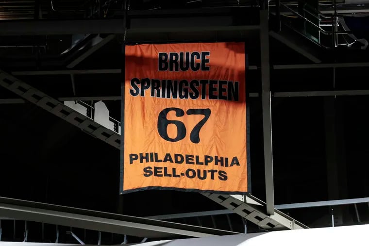 A banner hangs from the rafters as Bruce Springsteen and the E Street Band play at the Wells Fargo Center on March 16, 2023.