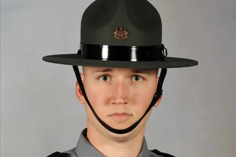 This undated photo provided by the  Pennsylvania State Police shows Trooper David Kedra. He was shot in the chest Tuesday, Sept. 30, 2014, during a yearly training exercise at the Montgomery County Public Safety Training Complex in Conshohocken, near Philadelphia, state police said. (AP Photo/ Pennsylvania State Police)