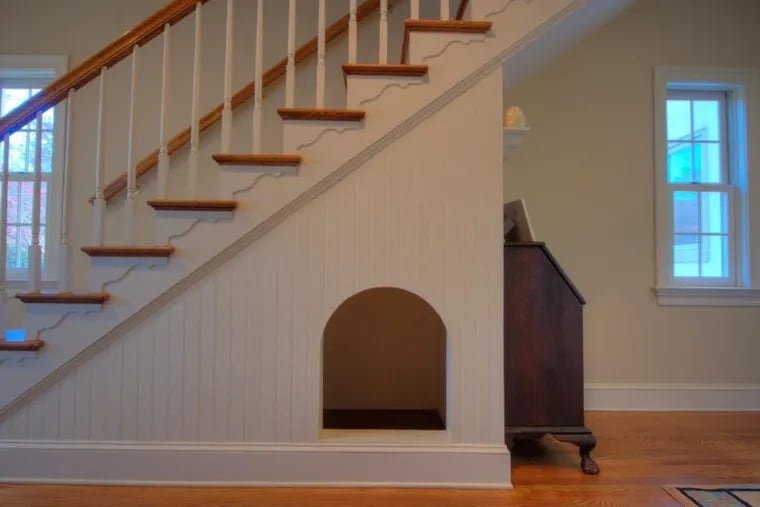 This Malvern home, on the market for $1,375,000, includes a built-in doghouse under the stairs.