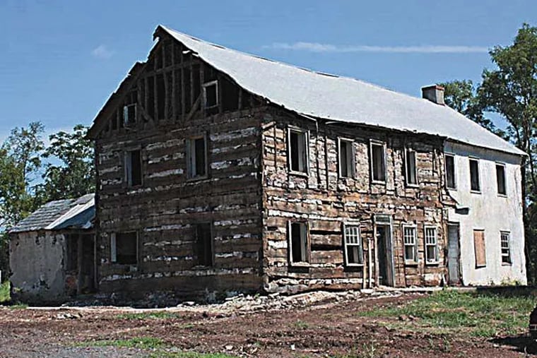 This is a pic of the 18th century log structure that was discovered beneath the modern façade of a farmhouse on the Hatfield property known as the Bishop Tract. The house dates back to about 1750-60. Back then, it was the home of the Rev. John Funk, who was a leader of the Funkites, a dissident group of Mennonites who broke from the church because of a disagreement over the Revolutionary War.

Please credit Lou Farrell