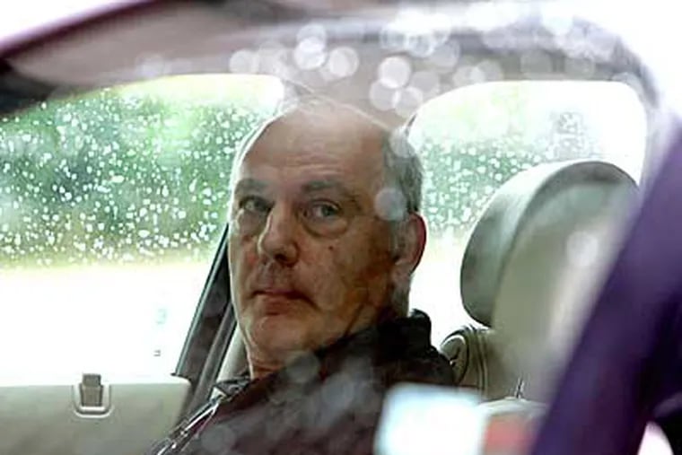 Edward Kanterman, 59, in his lawyer's car. Kanterman was charged in the death of his grandson, after allegedly leaving the baby alone in his hot car. (David
Swanson/Inquirer)