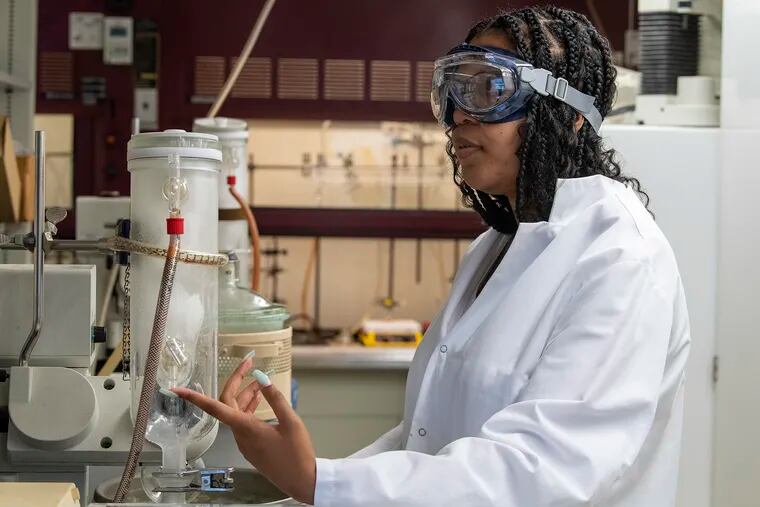Villanova student Chloe deGraft-Johnson works at the chemistry lab on July 28. She is  among 130 Villanova students back on campus for summer research for the first time since the coronavirus struck.