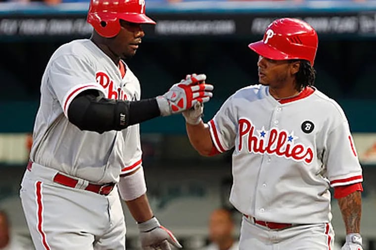 Ryan Howard recorded four hits and drove in four runs in the Phillies' 14-2 rout of the Marlins. (Wilfredo Lee/AP)