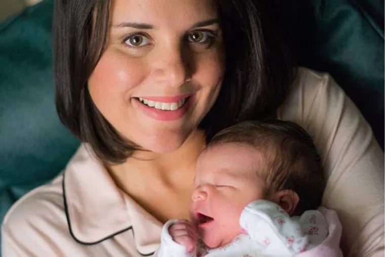 Kate Bilo and her newest family member, Solenne Marit Elisabeth. Bilo was hospitalized over the weekend after doctors found multiple blood clots in her lungs.