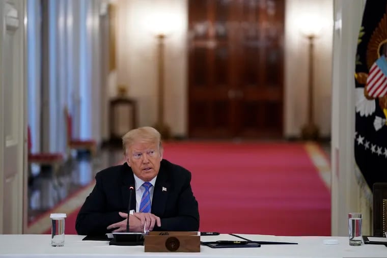 President Donald Trump listens during a meeting with the American Workforce Policy Advisory Board, in the East Room of the White House, Friday, June 26, 2020, in Washington.