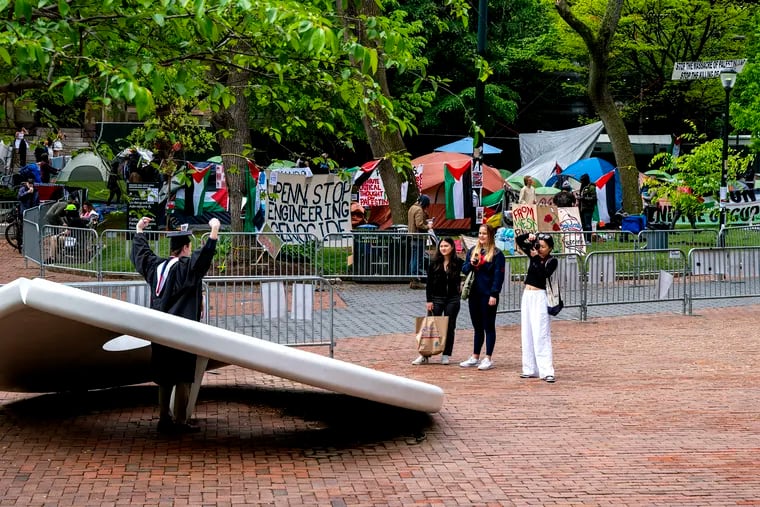 Graduation activity continues as the tent encampment remains in place at the University of Pennsylvania Sunday.
