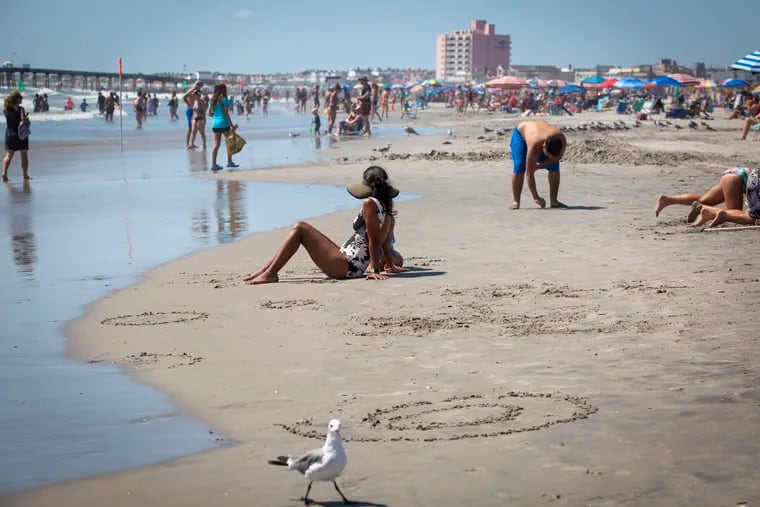 People gather at the beach in Ocean City, N.J., on Labor Day 2020.