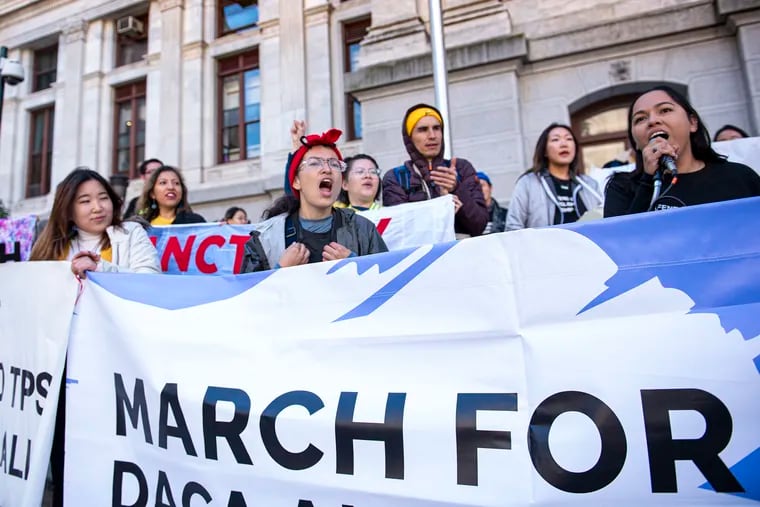 DACA recipients and supporters rally at Philadelphia City Hall on Friday as part of a New York-to-Washington march to demand that the Supreme Court allow the program to continue.