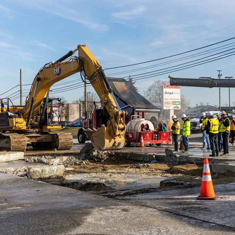 Construction workers on Dekalb Pike working on a sinkhole that closed the part of Route 202 in King of Prussia in December.
