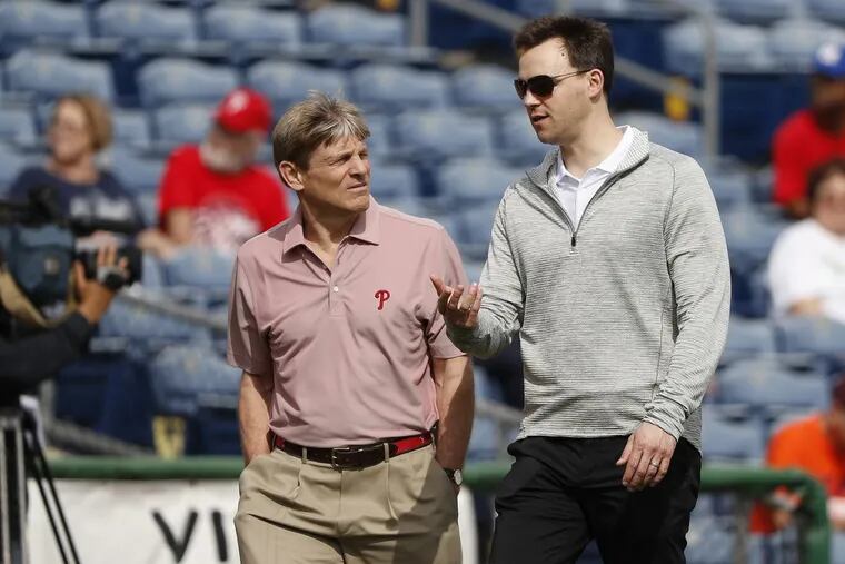 Phillies’ owner John S. Middleton (left) and GM Matt Klentak need to reel in a starting pitcher this offseason.