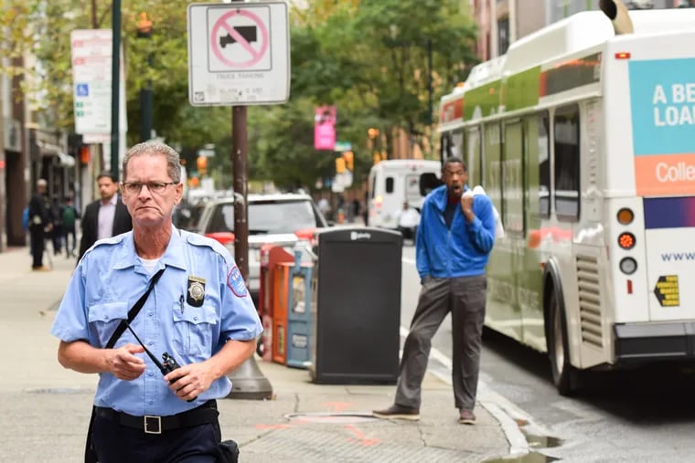 Traffic cops patrolled Chestnut and Market to enforce bike lanes, bus stops, and turning rules in an effort to improve congestion in Center City.