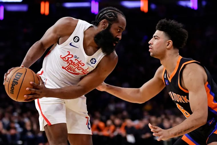 76ers guard James Harden looks to drive past New York Knicks guard Quentin Grimes on Christmas.