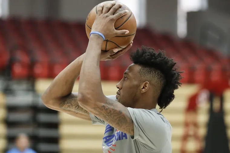 Sixers forward Robert Covington shoots the basketball before the start of team practice inside Lavietes Pavilion at Harvard University on Tuesday, May 1, 2018.