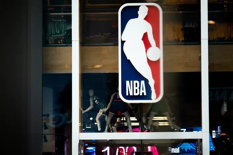 An NBA logo is shown at the 5th Avenue NBA store last year. The league, its players association and its teams, including the Sixers, supported Tuesday's guilty verdict in the George Floyd murder. (Jeenah Moon/Getty Images/TNS)