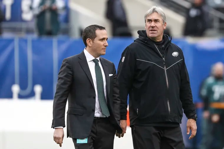 Eagles head coach Doug Pederson (left) and general manager Howie Roseman.