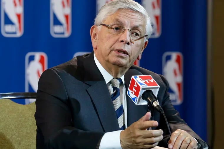 FILE - In this Wednesday, May 15, 2013 file photo, NBA Commissioner David Stern takes a question from a reporter during a news conference following an NBA Board of Governors meeting in Dallas. The NBA says former Commissioner David Stern suffered a sudden brain hemorrhage Thursday, Dec. 12, 2019 and underwent emergency surgery. The league says in a statement its thoughts and prayers are with the 77-year-old Stern's family.
