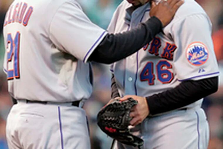 Mets pitcher Oliver Perez was visited by first baseman Carlos Delgado during Perez&#0039;s awful, and brief, Monday outing.