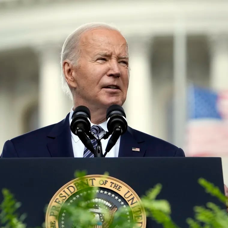 President Joe Biden speaks at a memorial service to honor law enforcement officers who've lost their lives in the past year, during National Police Week ceremonies at the Capitol in Washington on Wednesday.